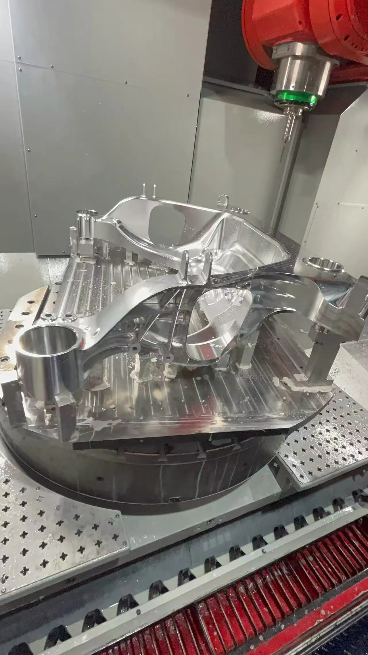 Five-axis CNC machining of automobile shock absorbers